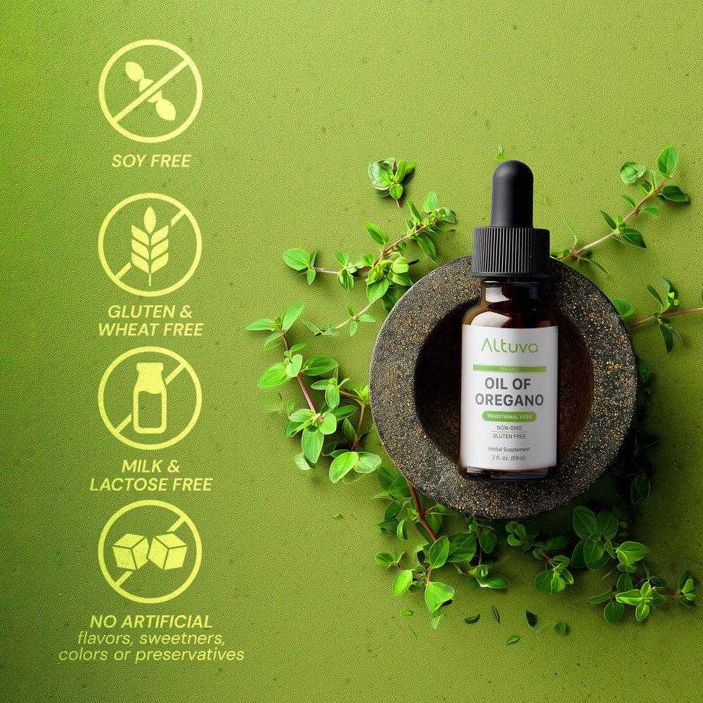 Attuva Oil of Oregano bottle with green leaves on a green background